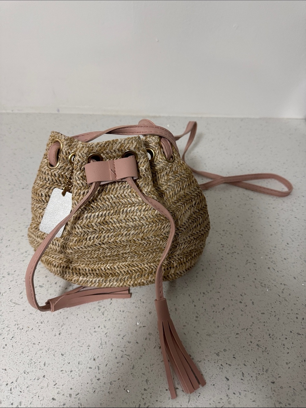 Straw Drawstring Bucket Bag with Pink Trim